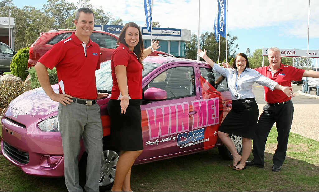 SWEET RIDE: Cassels Automotive dealer principal David Cassels with staff members Ashlee Hagan, Maddleane Brombey and Mick Cruise, showing off the Mitsubishi Mirage that could be yours. SWEET RIDE: Cassels Automotive dealer principal David Cassels with staff members Ashlee Hagan, Maddleane Brombey and Mick Cruise, showing off the Mitsubishi Mirage that could be yours.